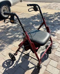 Carex 4-Wheel Rollator Mobility Walker with Seat & Brakes – $35