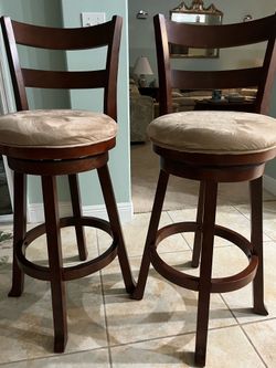 2 wooden bar stools