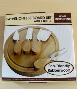 New in box swivel cheese board and tool set