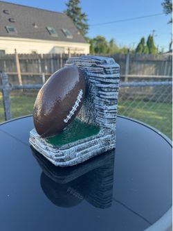 football bookend/shelf piece statue