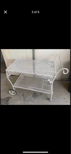 Rare 1940’s-1960’s Russell Woodard Rose wrought iron bar cart. All four wheels smooth