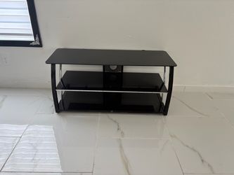 Table tv stand. Black glass