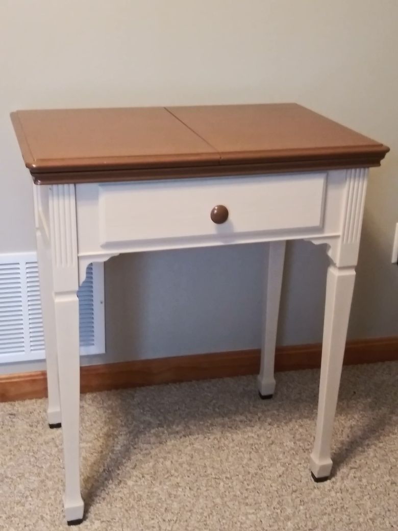 Antique sewing machine table