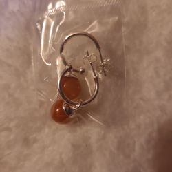 silver and orange jade like earings.