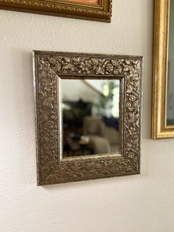 Ornate silver vintage-style mirror