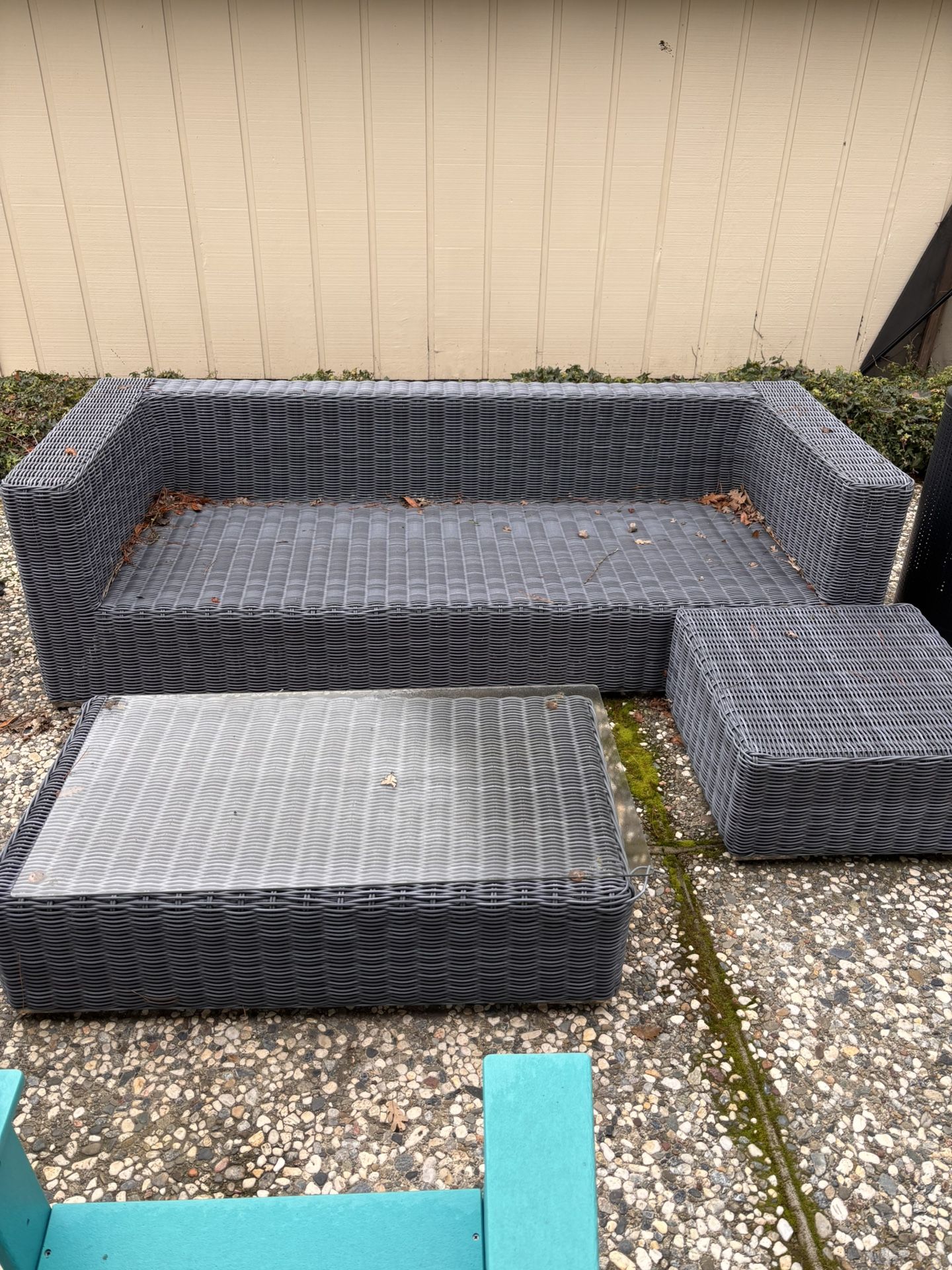 Grey Outdoor Wicker Sofa and Coffee Table