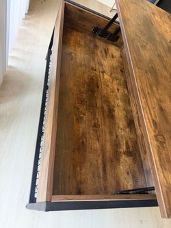 Coffee table with lift top