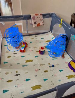 Large playpen with mat. Zippered entrance and grab bars