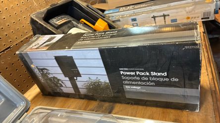 Power pack stand for lawn