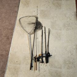 Lot Of 6 Old Fishing Rods And A Net