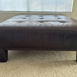 Chocolate Espresso Brown Leather "Sullivan" Ottoman of Pottery Barn in the early 1990's