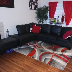 Black Sectional With Ottoman 