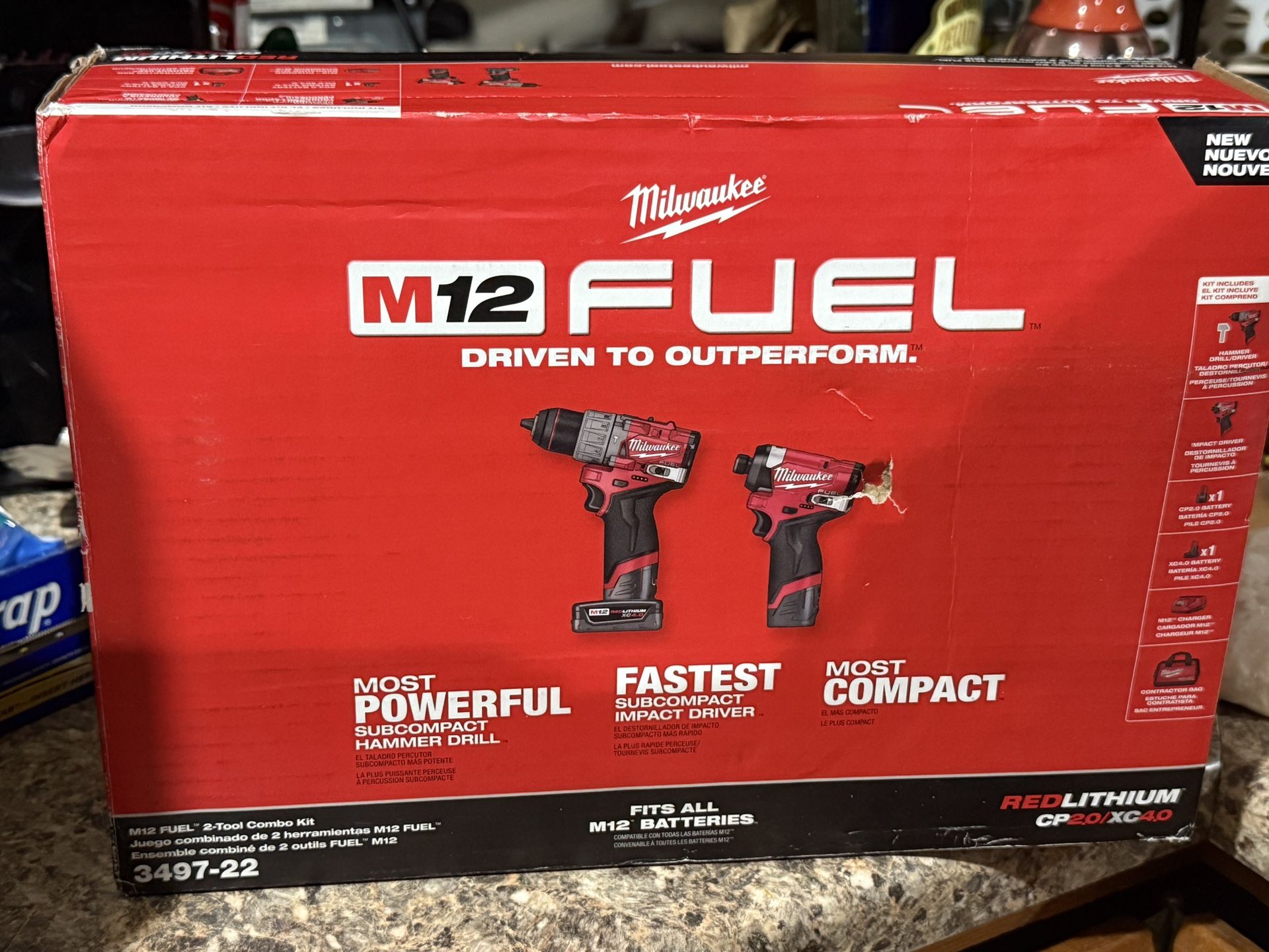 Brand New In Box  Combo Kit Milwaukee M12 Impact Driver, Hammer drill, 2 Batterie's And Chargers With A Bag