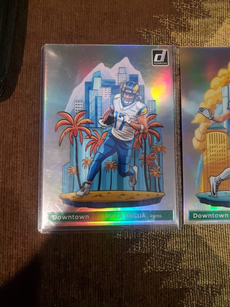 2 Big Downtowns Puka  Nacua, Sam LaPorta. 1 Big Marshawn Lynch Card /49