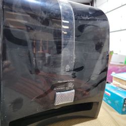 Tork  Brand Paper Towel Dispenser. Intuition 