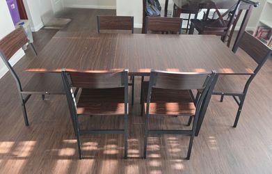 Like-New Extendable Dining Table Set with 6 Chairs – Dark Walnut / Black Metal Frame