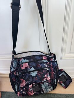 ETA travel purse