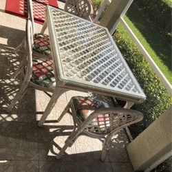 Wicker Glass Top Table & 4 Covered Chairs