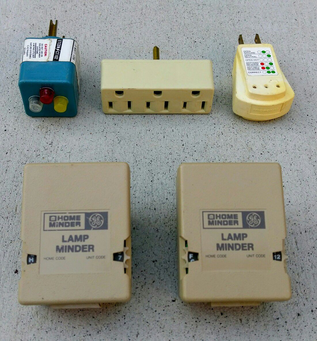 Vintage lamp minders, outlet circuit testers and a 3-plug wall tap adapter