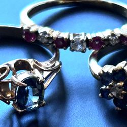 Set of Three Gold Rings with Gemstones 