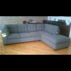 GREY CHASE SOFA W/ LET OUT BED