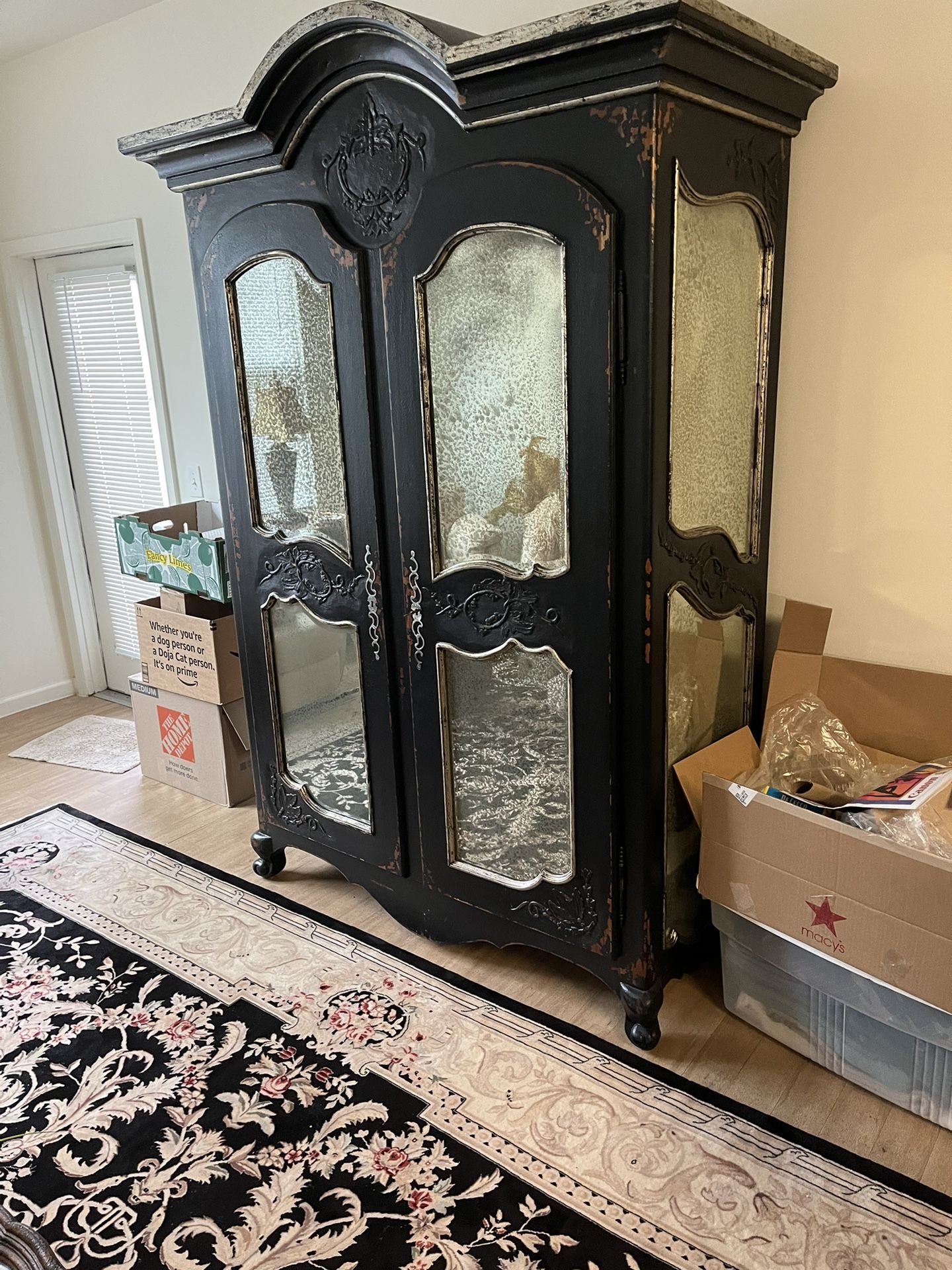 Armoire antique blackfish with mirrors in the front of the doors it’s a big unit