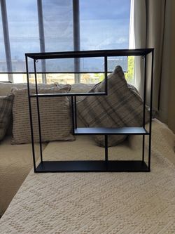 modern geometric metal wall shelf/display shelf.