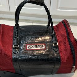 Luggage Brighton Rolling Duffel Weekender Red and Black. Leather and  Canvas. 21 “ x 10” x 12”