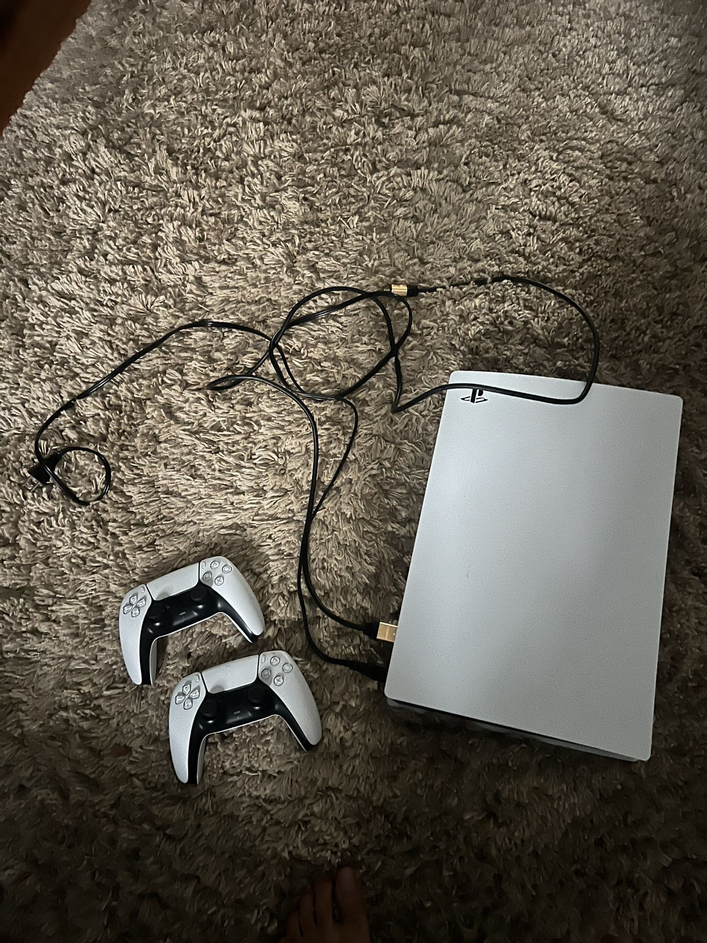 PS5 with 2 controllers and digital games