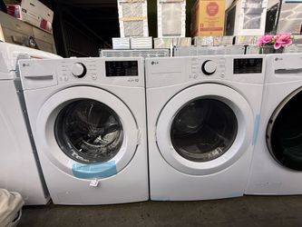 Brand new LG white front load washer and gas dryer set