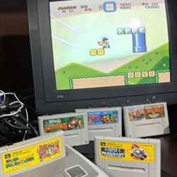 Japanese Super Nintendo/Famicom console with 5 games and 2 controllers