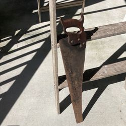 Old School Ladder And Saw