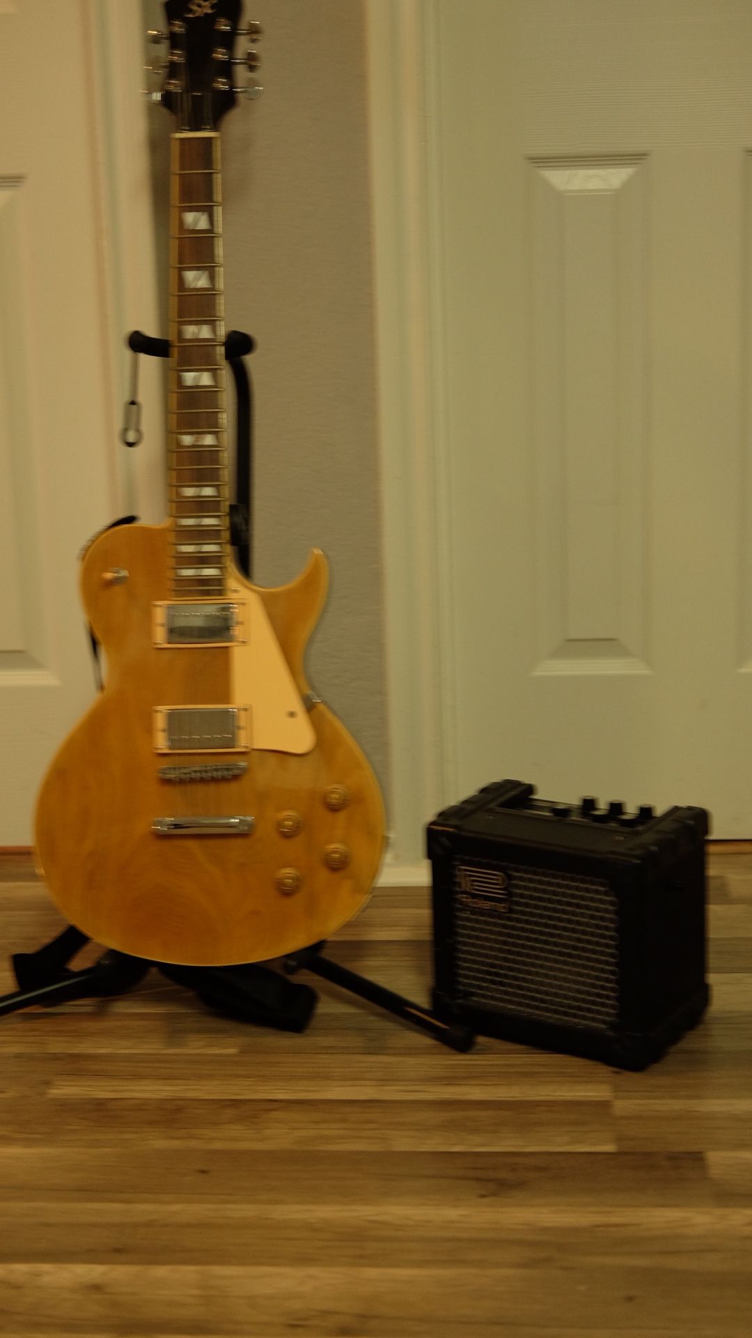 Guitar and Roland mini cube amp for $150!!