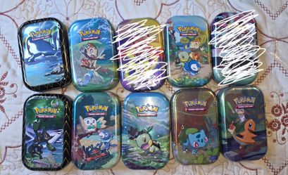 Pokémon mini empty tins