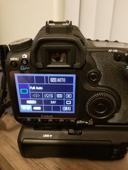 Canon 50D camera..with 7 batteries and backpack
