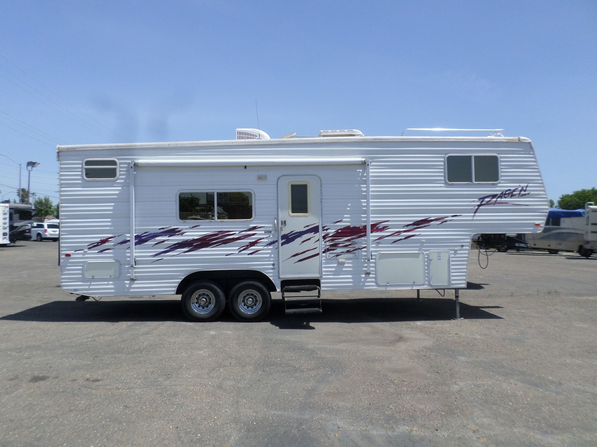2003 30.5’ Rage’n Fifth Wheel Toy Hauler