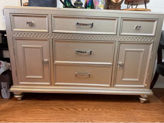 Elegant Champagne Silver Accent Cabinet