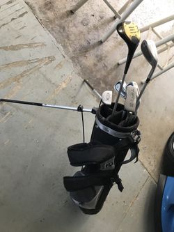 Kids Bag and misc clubs/ putter
