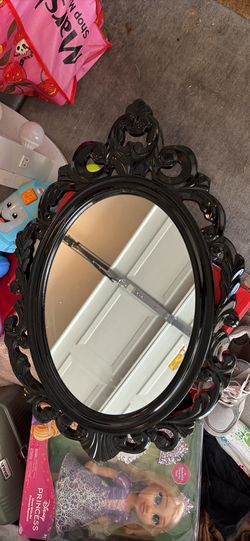 Black ornate mirror