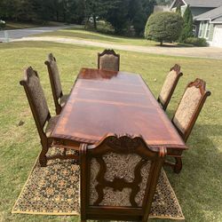 Beautiful dining table with six chairs