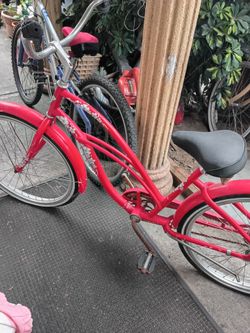 Red female beach cruiser