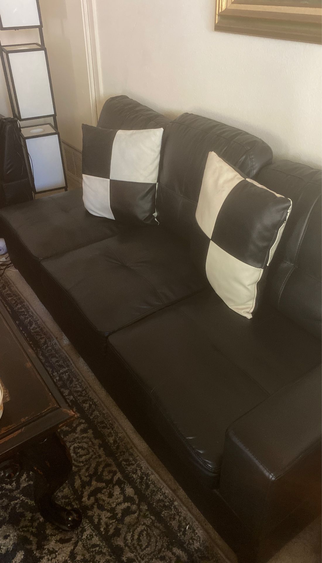 Black leather Sectional Couches