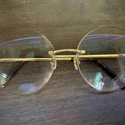 Cartier (rimless) Glasses 