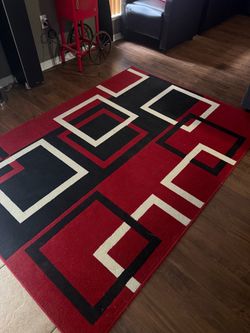 Red and black and cream/ area rug 5 x 7