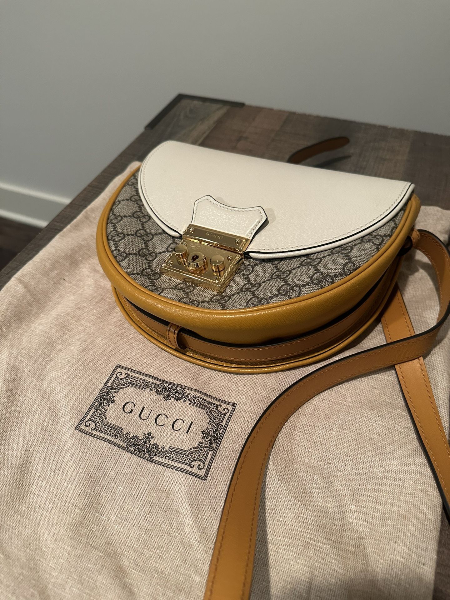 GUCCI GG SUPREME PADLOCK SMALL SADDLE CROSSBODY BAG