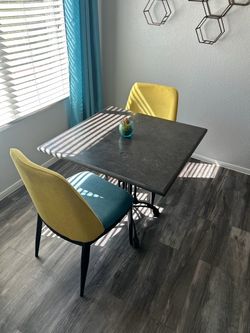 Dining Table with 2 Yellow Chairs