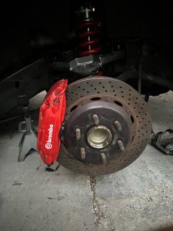 Brembo Red Brake Caliper with Drilled Rotor
