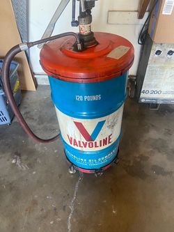Old shop gear oil container with pump