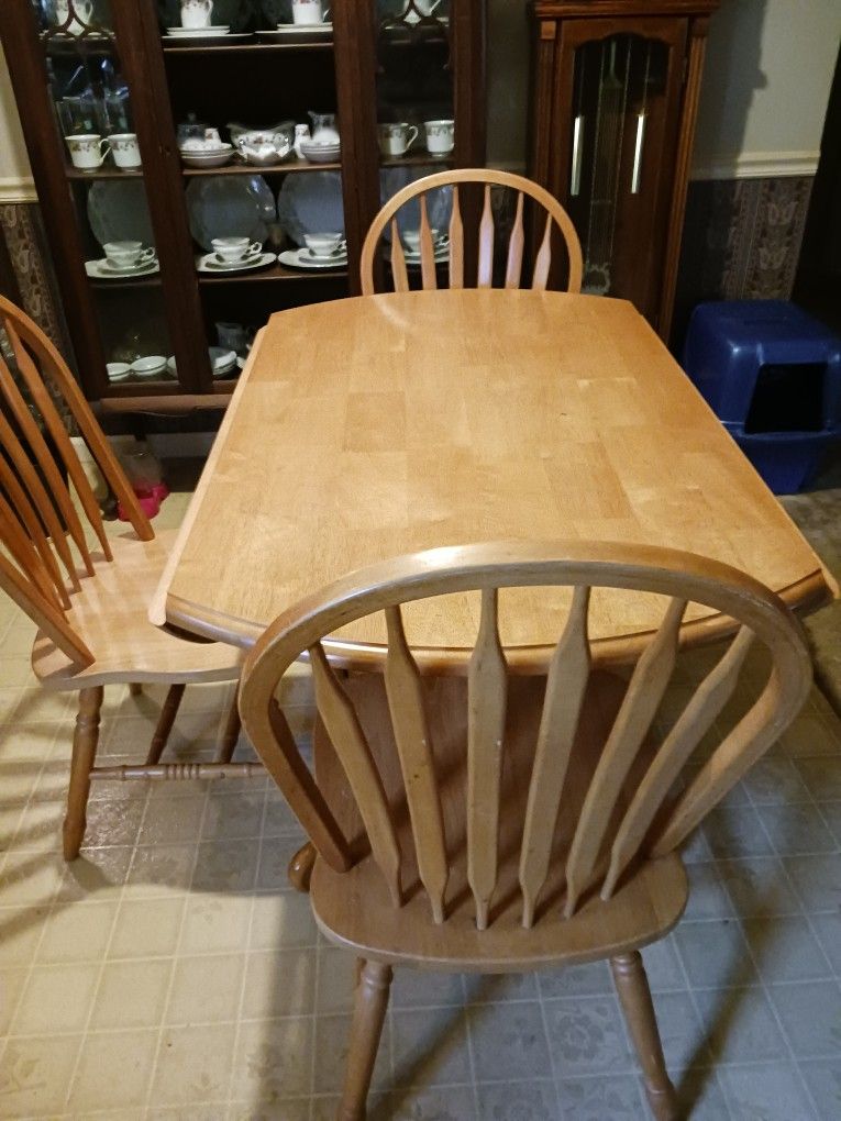 Round Table With Fold Down Sides Plus Three  Chairs. 