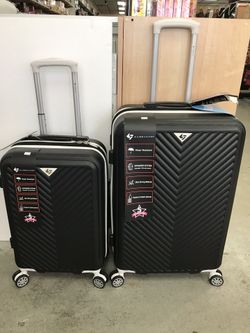 Hard case 2 pice luggage set includes large size ( 30"x20"x12) and Carry-on size (20"x14"10). Has 8 spinner wheels for 360 degrees of mobility light
